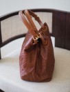 Stor flettet skinnveske cognac thumbnail