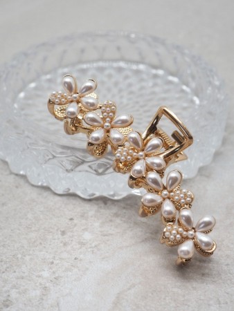 Emaljert hårklype med blomster og perler